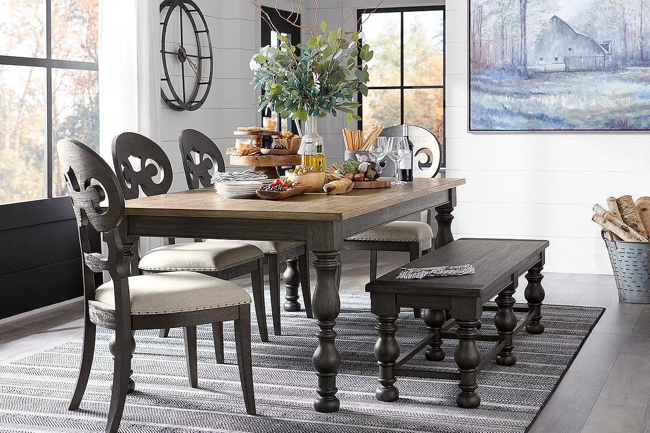 Barrington Dining Table in Antique Oak/Matte Black and Scroll Side Chairs and Bench in Matte Black in a room scene.